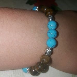 A tiger eye bead bracelet with turquoise beads